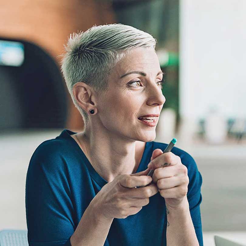 Woman looking off into the distance discussing legal advice
